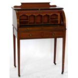 Edwardian mahogany cylinder bureau, the fitted interior raised on square section tapering legs,