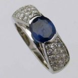 Sapphire and pave diamond 18ct gold ring, the oval mixed cut coloured stone approximately 1.5ct,