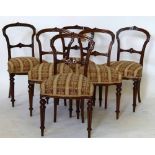 Set of six Victorian walnut spoon back dining chairs with stuffed over seats on turned and fluted