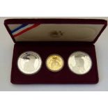 1984 USA proof Olympiad set of gold $10 and two silver $1, in original box.