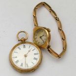Swiss 14K gold fob watch, white enamel Roman dial, metal cuvette, key wind and set barred