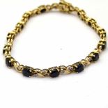 9ct gold sapphire and diamond line bracelet, length 18.5cm, gross weight 8.7g