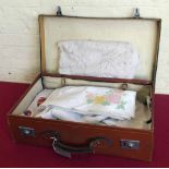 Cowhide suitcase and a quantity of mixed linen. Condition report: see terms and conditions