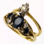 18ct (750) single stone marquise diamond ring and an 18ct gold sapphire and diamond dress ring (