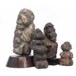 Two Kissi Nomoli stone figures, together with two other stone figures, (4) the tallest measures 16cm