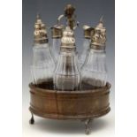 George III mahogany cruet with a silver handle (sterling and duty marks only), the base containing