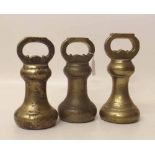 Three brass bell weights. Condition report: see terms and conditions