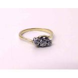 Unmarked three-stone diamond ring, 2.7g gross. Condition report: see terms and conditions
