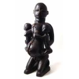 Large Makonde sewn wood maternity figure, 77cm high All lots in this Tribal and African Art Sale are