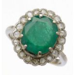 Emerald and diamond oval cluster ring the central stone approximately 2.3ct (10.8 x 9.67 x 4.