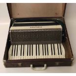 Hohner accordian in case. Condition report: see terms and conditions