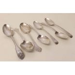 Four Victorian silver bright cut table spoons and three other silver table spoons. Condition report: