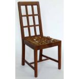 Stanley Webb Davies oak lattice back chair, 1930, the drop in seat woven with leather strips (