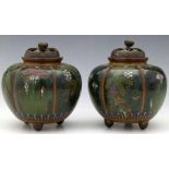 Pair of Japanese cloisonné melon shaped koros, diameter 10cm (both dented) with wooden stands.
