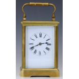 French brass carriage clock, early 20th century, corniche case, white enamel Roman dial, eight day