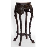Late 19th century Burmese rosewood carved jardiniere stand, height 90cm.