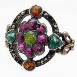 French ruby, emerald and marcasite ring, 19th century, the oval setting of a central peridot