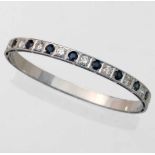 18ct (750) white gold sapphire and diamond hinged bangle, width overall 6cm, gross weight 18.7g