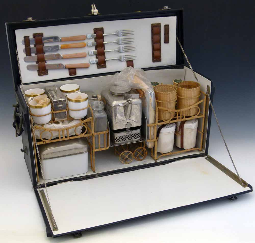 Motor-car picnic set, 1930's, for four people, the black leather cloth cabinet with a fall front