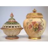 Two Royal Worcester pot-pourri vases, one with pierced cover and body, the second with pierced cover