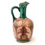 Della Robbia ewer circa 1900, incised and painted with leaves and floral bosses, incised and painted