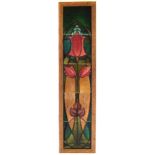 Art Nouveau tile set, decorated with tube lined stylised flowers and leaves set within oak frame,