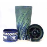 Three pieces of Moorcroft, to include a waving corn pattern vase, a moonlit blue dish and preserve