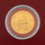 South Africa Krugerrand, 1974 (UNC) in its Spink blister case.