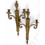 Pair of neo-classical cast brass or bronze wall sconces, length 65cm.