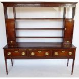 18th century oak dresser with an open rack, banded in mahogany, length 185cm.