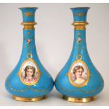 Pair of Coalport vases, painted with portraits of ladies within raised gilt borders on turquoise