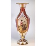 Bohemian overlay glass vase, the white top layer cut through to ruby glass, painted with a lady