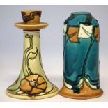 Minton Secessionist ware vase and candlestick, tube lined with stylised floral patterns on yellow