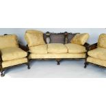 Black chinoiserie bergère three-piece suite with double caned sides, upholstered in yellow damask.