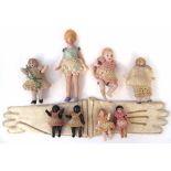 Eight miniature bisque dolls Hertwig or Carl Horn, with jointed legs and arms, also a pair of