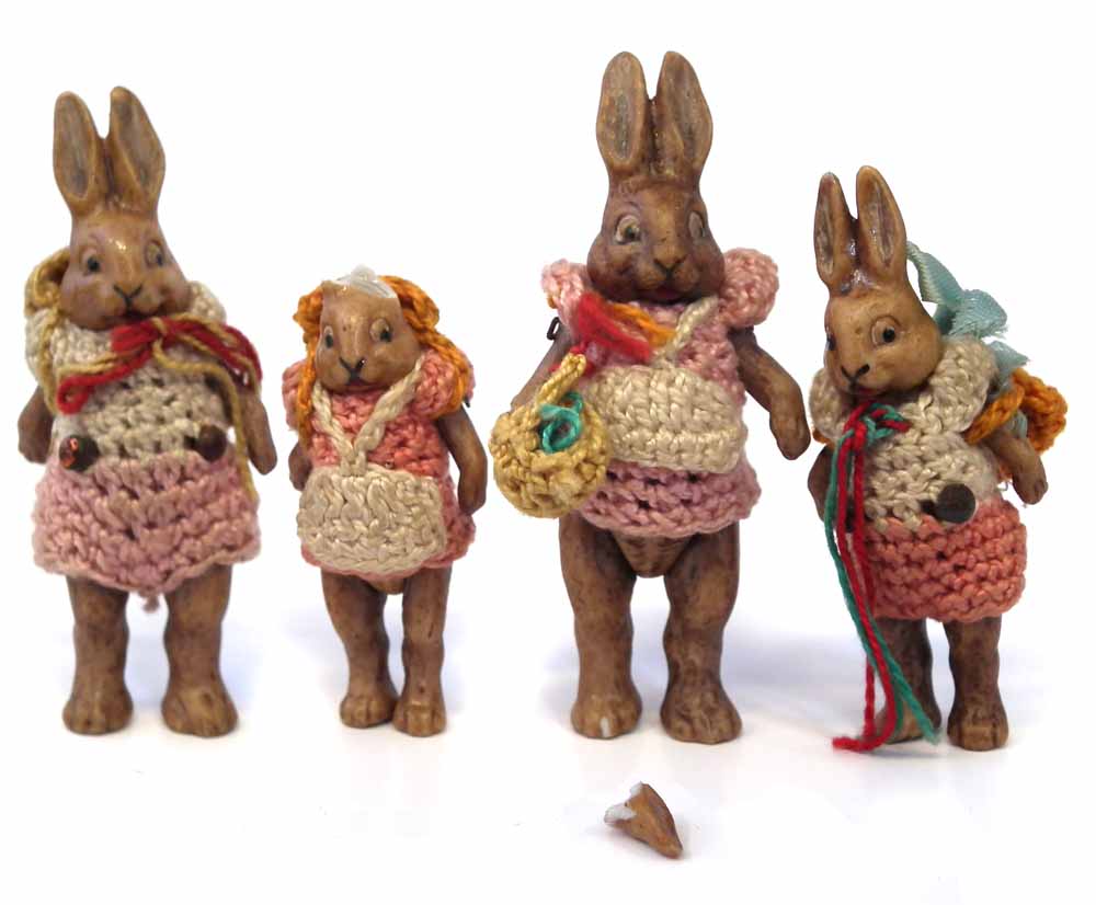 Hertwig four piece bisque Rabbit doll family, with porcelain jointed legs and arms, the tallest