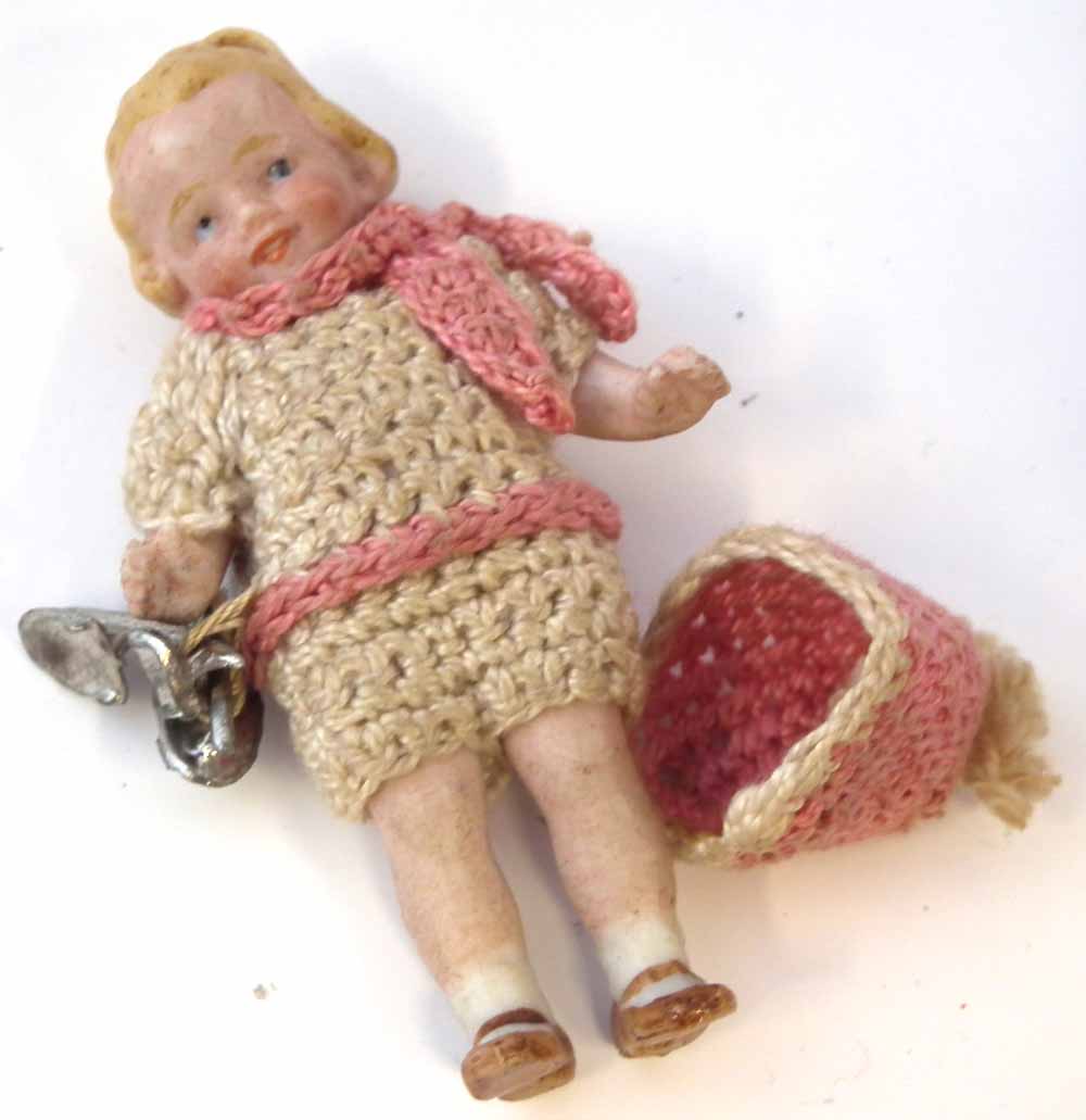 Hertwig bisque Skater doll, together with two other similar dolls, with porcelain jointed legs and - Image 4 of 5