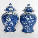 Pair of Chinese blue and white baluster vases and covers, late Qing Dynasty, four character nian zhi