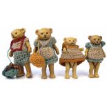 Hertwig four piece bisque Teddy doll family, with porcelain jointed legs and arms, the tallest