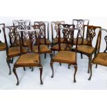 Set of twelve Chippendale style mahogany dining chairs, circa 1900, with drop-in leather seats.