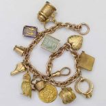 9ct gold charm bracelet of twelve charms, length 21cm, 43.3g