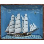 A late 19th century cased diorama model of a three mast galleon in sail with painted detail, set