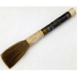 Chinese bone and polished stone large calligraphy brush, overall length 38cm. Condition report: good