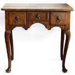 Walnut kneehole side table, the herring banded top with indented corners over three drawers on