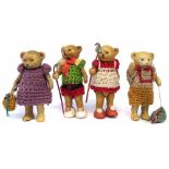 Hertwig four piece bisque Teddy doll family, with porcelain jointed legs and arms, the tallest