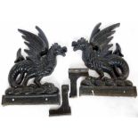 Pair of cast iron griffins, flat backed, height 70cm, together with a pair of brackets