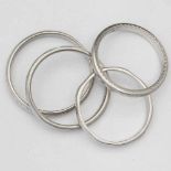 Four platinum wedding rings, gross weight 12.3g.