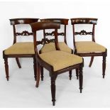 Four William IV rosewood dining chairs with upholstered drop in seats.