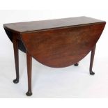 Mid 18th century walnut oval drop leaf table on pad feet, length 123cm