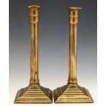 Pair of 18th century bell metal candle sticks, height 26cm.